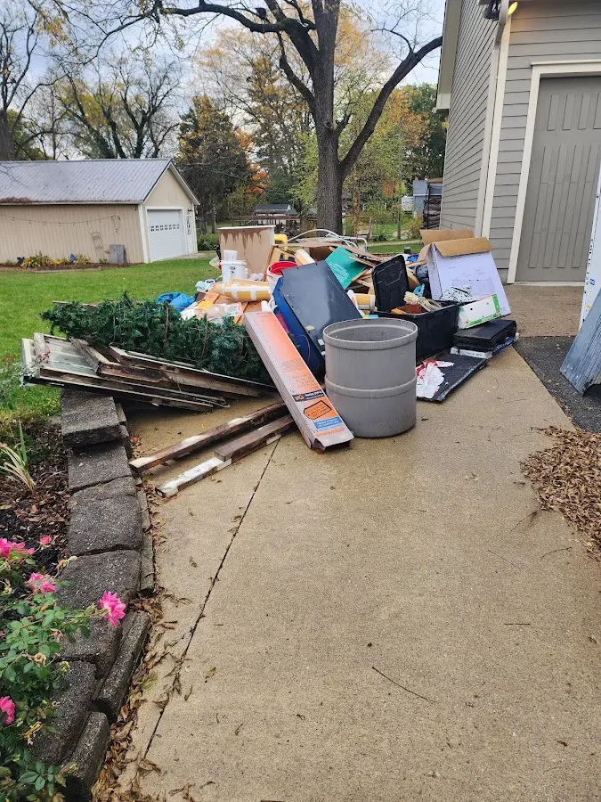 Dumpster being loaded with debris for Demolition Dumpster Rental in Staunton